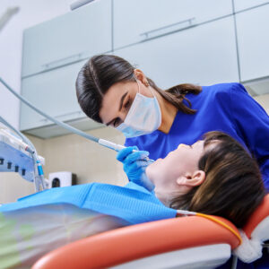 a patient receiving care from a dentist